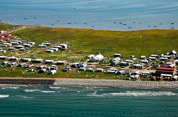 Houses along peninsula surrounded by ocean