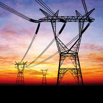 electrical generators with dramatic sunset