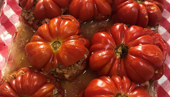 red beefsteak tomatoes stuffed with wild rice