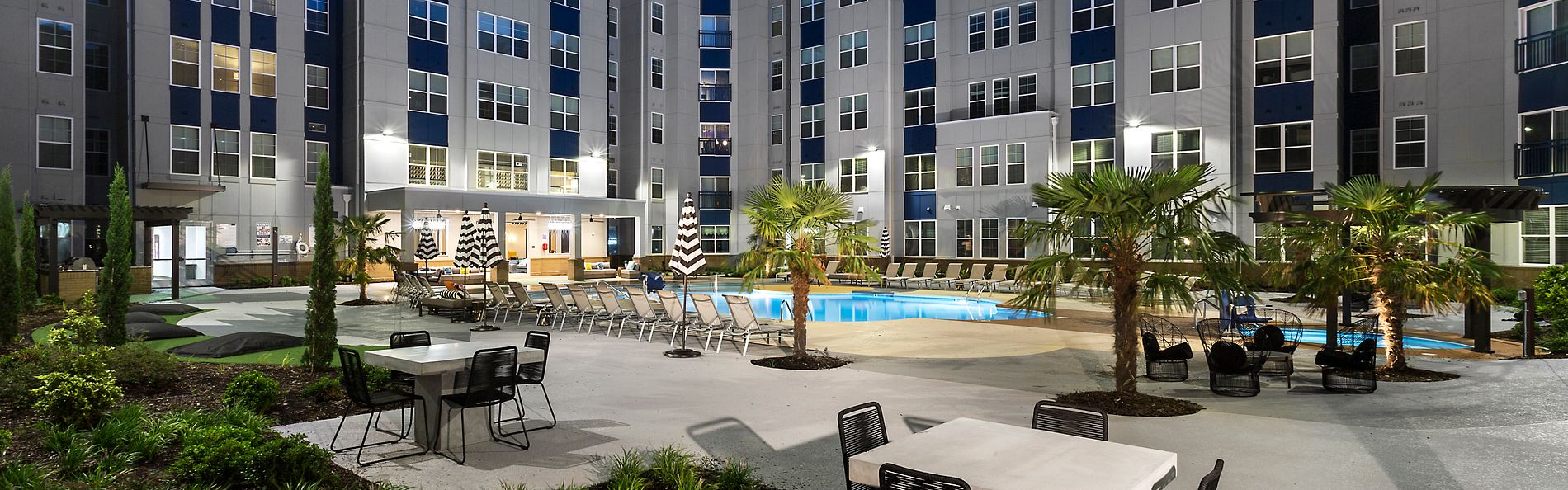 Pool side area of Gather Uptown Apartments 