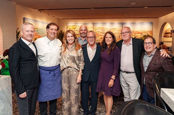 A group photo of President & CEO David Ludwigson, Board member Chef Mike Anthony, host Dena Lombardo, Chief Philanthropy Officer Stephen Covello, host Sam Lombardo, Special Advisor to the President & CEO Karen Pearl, Board member David Terveen, and Board of Trustees member James Palazza.