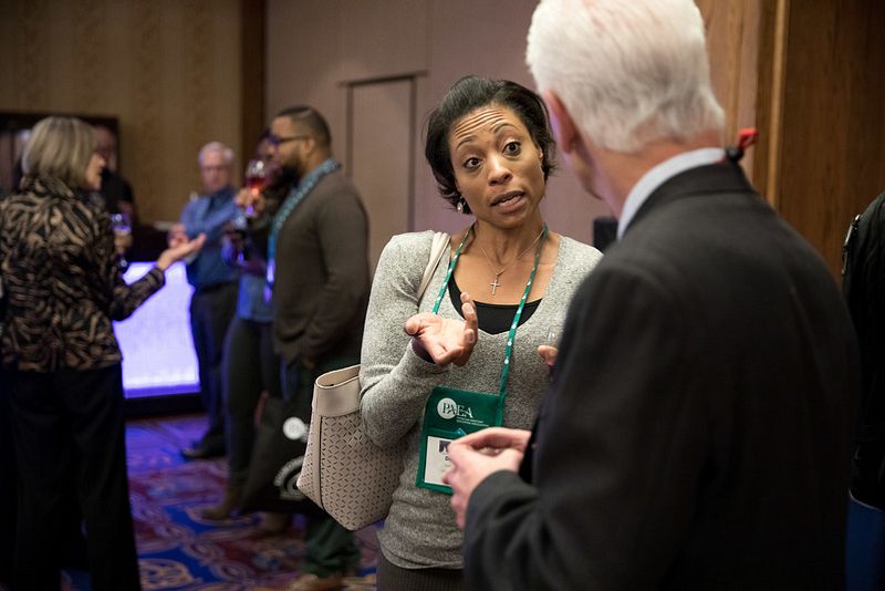 Attendees chat during the volunteer reception at the 2016 Education Forum in Minneapolis.