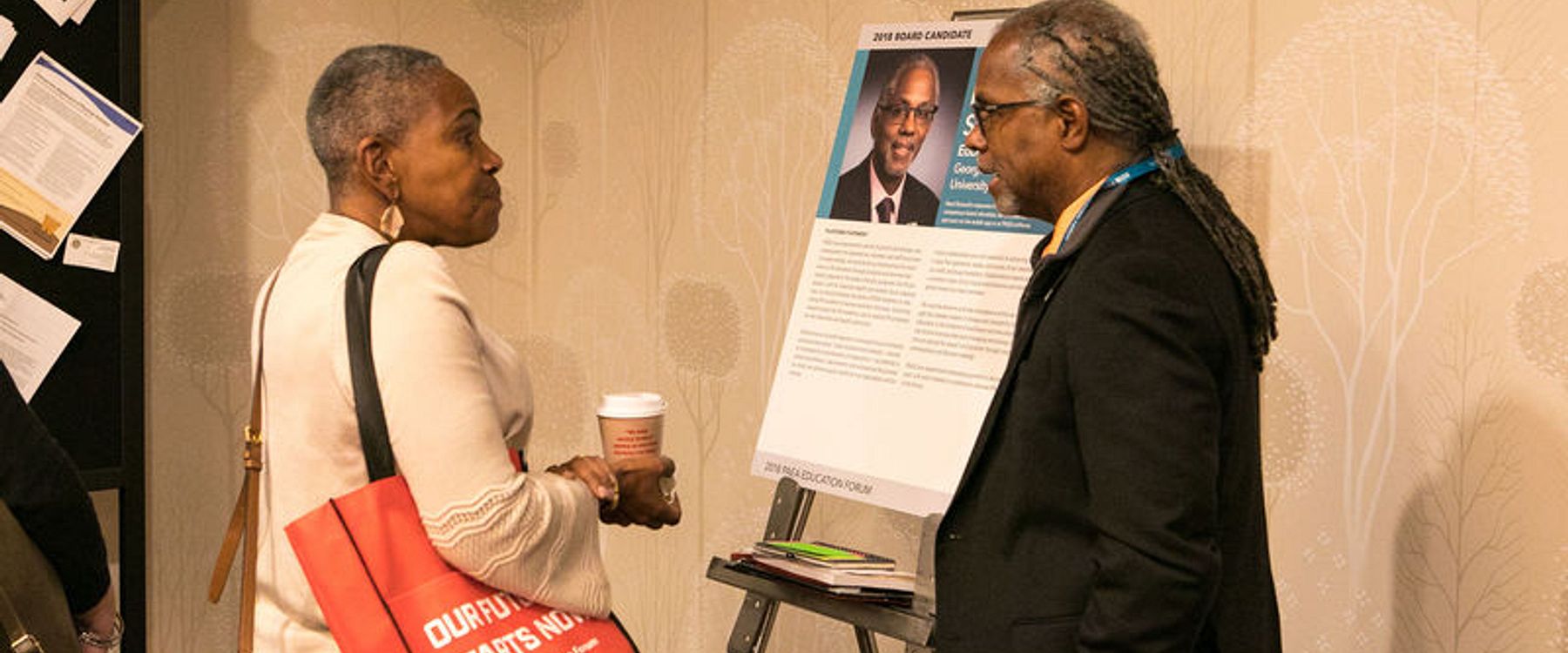 Howard Straker talks with a member during the Board of Directors candidates' meet and greet at the 2018 Education Forum.