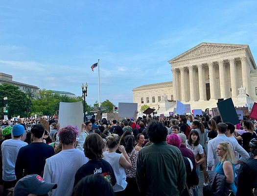 Protesters gather outside of the Supreme Court
