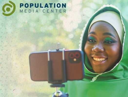 Screen shot of the cover of our 2021 Annual Report. Image includes PMC logo and a young woman smiling into a phone on a selfie stick