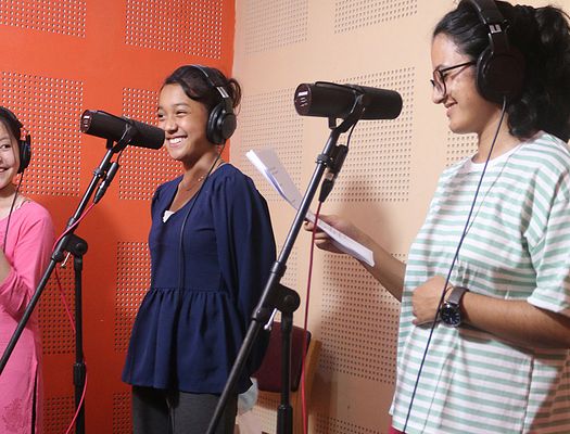 Three actresses for Rope Guna Fal in the recording studio.