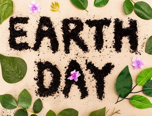 Earth Day written in dirt