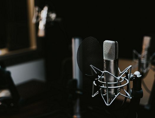 Podcast mic. Photo by Jonathan Velasquez on Unsplash.