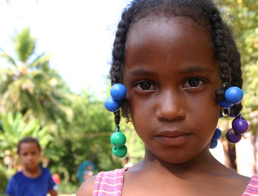 Girl and Boy in Dominican Republic Looking into Camera